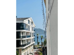 100 metres from the sea 2+1 partial sea view flat for sale